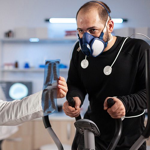Medical,Researcher,Examining,Evolution,Of,Athlete's,Health,Condition,,Looking,At